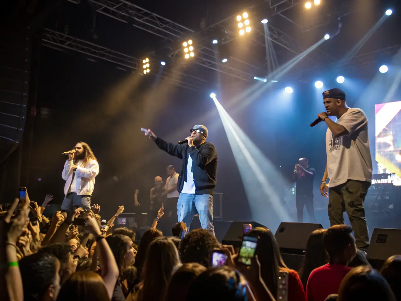 A dynamic image of a live musical performance at one of L'ANODINE's events, capturing the energy and excitement of the performers and the audience.